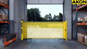 Retractable safety barrier blocking access to a warehouse maintenance area near a loading docks