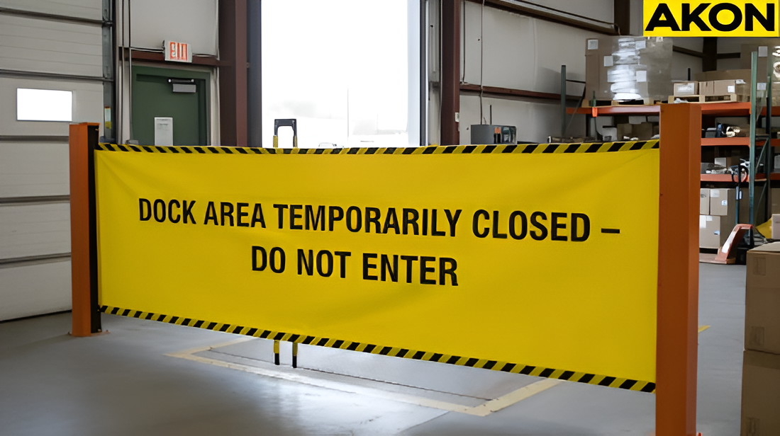 Retractable safety barriers blocking a warehouse docks area temporarily closed to foot traffics